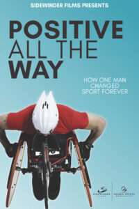 Film Poster with Positive All the Way title and man in racing wheelchair 